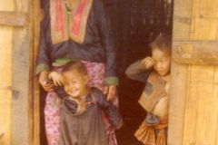 Thailand - Golden Triangle Trekking - Karen hill tribe mother and children in Northern Thailand