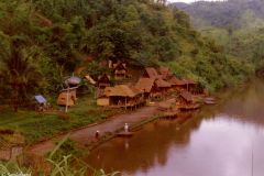 Thailand - Mae Sai - Bungalows on the Mae Sai River. Burma is across the river