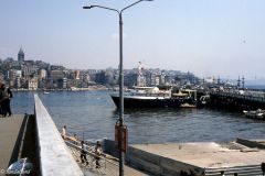 Turkey - Istanbul - The Galata Bridge with the Galata Tower to the left on the other side