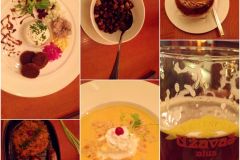 Latvia - Riga traditional meal with herring tartare, greys peas with smoked bacon, pumpkin soup, sausage and stewed cabbage, rye bread dessert, and dark beer