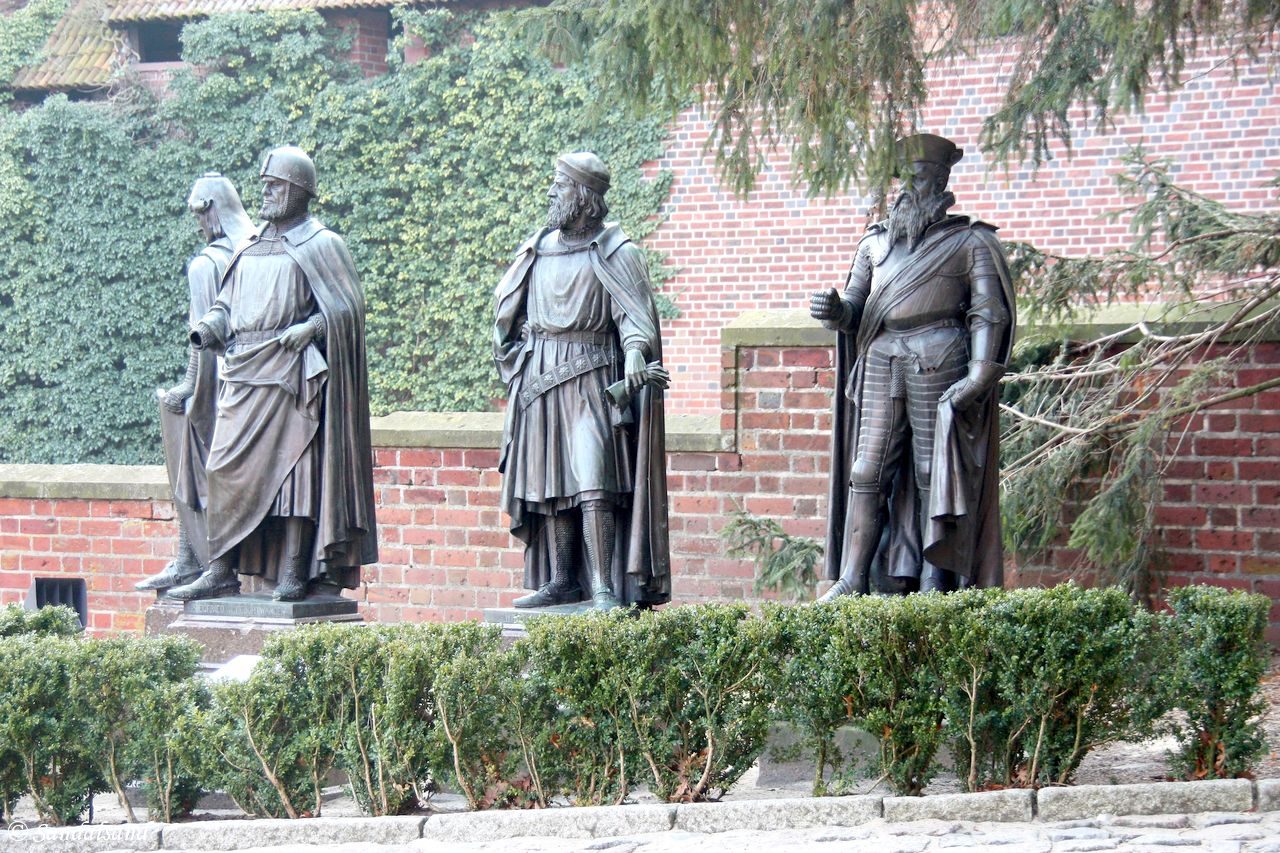 Poland - Malbork Castle - The Middle Castle Courtyard - Statues of Grand Masters